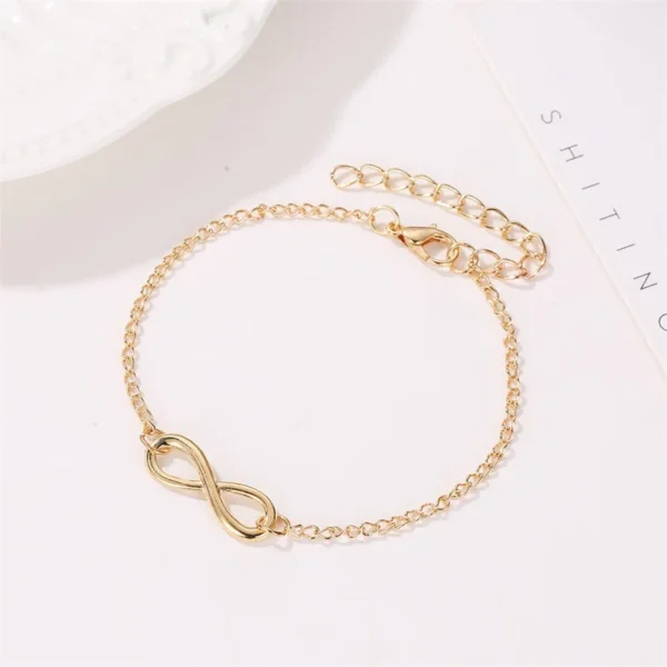 ⁦بسيطة الذهبي الفضة اللون إنفينيتي سوار للنساء عدد 8 Charms أساور أساور موضة غير عادية مجوهرات الحفلات LoverGift⁩ - الصورة ⁦2⁩